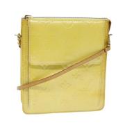 Pre-owned Leather clutches Louis Vuitton Vintage , Yellow , Dames