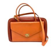 Pre-owned Leather handbags Hermès Vintage , Orange , Dames