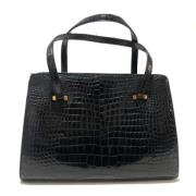 Pre-owned Fabric handbags Hermès Vintage , Black , Dames