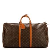 Pre-owned Coated canvas handbags Louis Vuitton Vintage , Brown , Dames