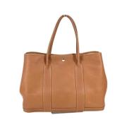 Pre-owned Leather handbags Hermès Vintage , Brown , Dames