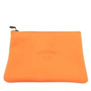 Pre-owned Fabric clutches Hermès Vintage , Orange , Dames