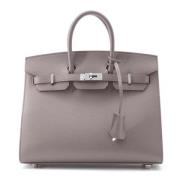 Pre-owned Leather handbags Hermès Vintage , Brown , Dames