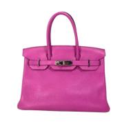 Pre-owned Leather handbags Hermès Vintage , Pink , Dames