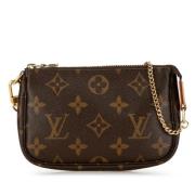 Pre-owned Canvas clutches Louis Vuitton Vintage , Brown , Dames