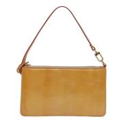 Pre-owned Leather clutches Louis Vuitton Vintage , Beige , Dames