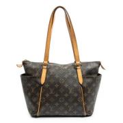 Pre-owned Canvas handbags Louis Vuitton Vintage , Brown , Dames