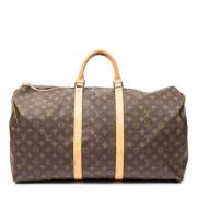 Pre-owned Coated canvas handbags Louis Vuitton Vintage , Brown , Dames