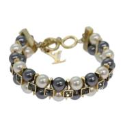 Pre-owned Metal bracelets Louis Vuitton Vintage , Yellow , Dames