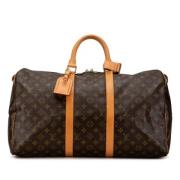 Pre-owned Canvas handbags Louis Vuitton Vintage , Brown , Dames