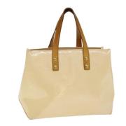 Pre-owned Leather handbags Louis Vuitton Vintage , Beige , Dames