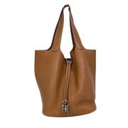 Pre-owned Leather handbags Hermès Vintage , Brown , Dames