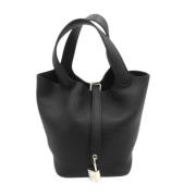 Pre-owned Leather handbags Hermès Vintage , Black , Dames