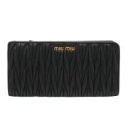 Pre-owned Leather wallets Miu Miu Pre-owned , Black , Dames