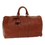 Pre-owned Leather travel-bags Louis Vuitton Vintage , Brown , Dames