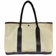 Pre-owned Canvas handbags Hermès Vintage , Beige , Dames