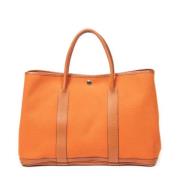 Pre-owned Canvas handbags Hermès Vintage , Orange , Dames