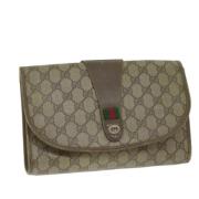 Pre-owned Canvas clutches Gucci Vintage , Beige , Dames