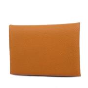 Pre-owned Leather wallets Hermès Vintage , Yellow , Dames