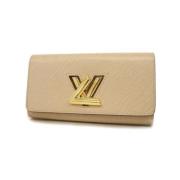 Pre-owned Fabric wallets Louis Vuitton Vintage , Beige , Dames