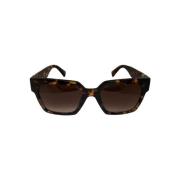 Stijlvolle Mod. 0MU 04vu Zonnebril Miu Miu , Brown , Unisex