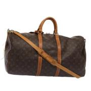 Pre-owned Canvas handbags Louis Vuitton Vintage , Brown , Dames