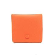 Pre-owned Leather wallets Hermès Vintage , Orange , Dames