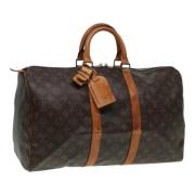 Pre-owned Canvas travel-bags Louis Vuitton Vintage , Brown , Dames