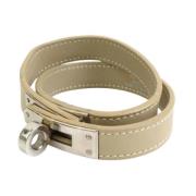 Pre-owned Leather bracelets Hermès Vintage , Beige , Dames