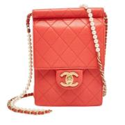 Pre-owned Leather clutches Chanel Vintage , Red , Dames