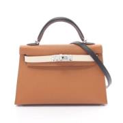 Pre-owned Canvas handbags Hermès Vintage , Brown , Dames