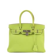 Pre-owned Canvas handbags Hermès Vintage , Green , Dames