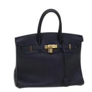 Pre-owned Leather handbags Hermès Vintage , Blue , Dames