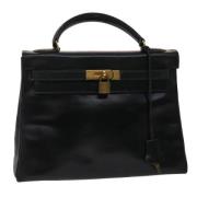 Pre-owned Leather handbags Hermès Vintage , Black , Dames