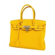 Pre-owned Leather handbags Hermès Vintage , Yellow , Dames