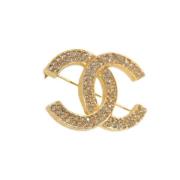 Pre-owned Metal brooches Chanel Vintage , Yellow , Dames