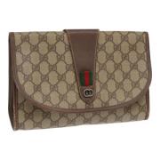 Pre-owned Leather clutches Gucci Vintage , Beige , Dames