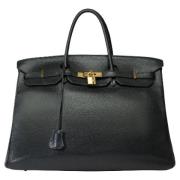 Pre-owned Leather handbags Hermès Vintage , Black , Dames