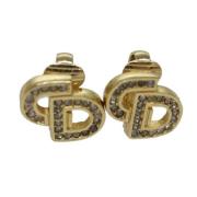 Pre-owned Metal earrings Dior Vintage , Yellow , Dames