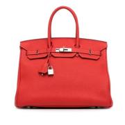 Pre-owned Leather handbags Hermès Vintage , Red , Dames