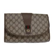 Pre-owned Leather clutches Gucci Vintage , Brown , Dames