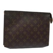 Pre-owned Canvas pouches Louis Vuitton Vintage , Brown , Dames