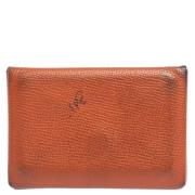 Pre-owned Leather clutches Hermès Vintage , Orange , Dames