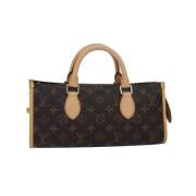 Pre-owned Canvas handbags Louis Vuitton Vintage , Brown , Dames