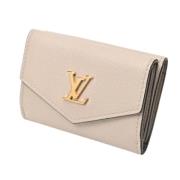 Pre-owned Fabric wallets Louis Vuitton Vintage , Beige , Dames