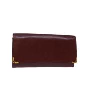 Pre-owned Leather clutches Cartier Vintage , Red , Dames