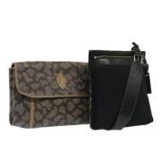 Pre-owned Leather clutches Yves Saint Laurent Vintage , Gray , Dames