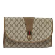 Pre-owned Leather clutches Gucci Vintage , Beige , Dames