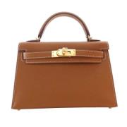 Pre-owned Leather handbags Hermès Vintage , Brown , Dames