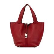 Pre-owned Leather handbags Hermès Vintage , Red , Dames